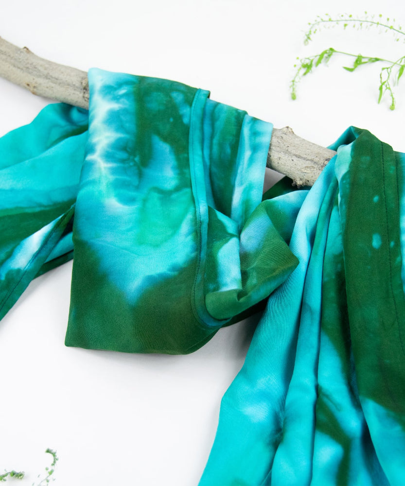 Teal and green tie dye scarf by Akasha Sun.