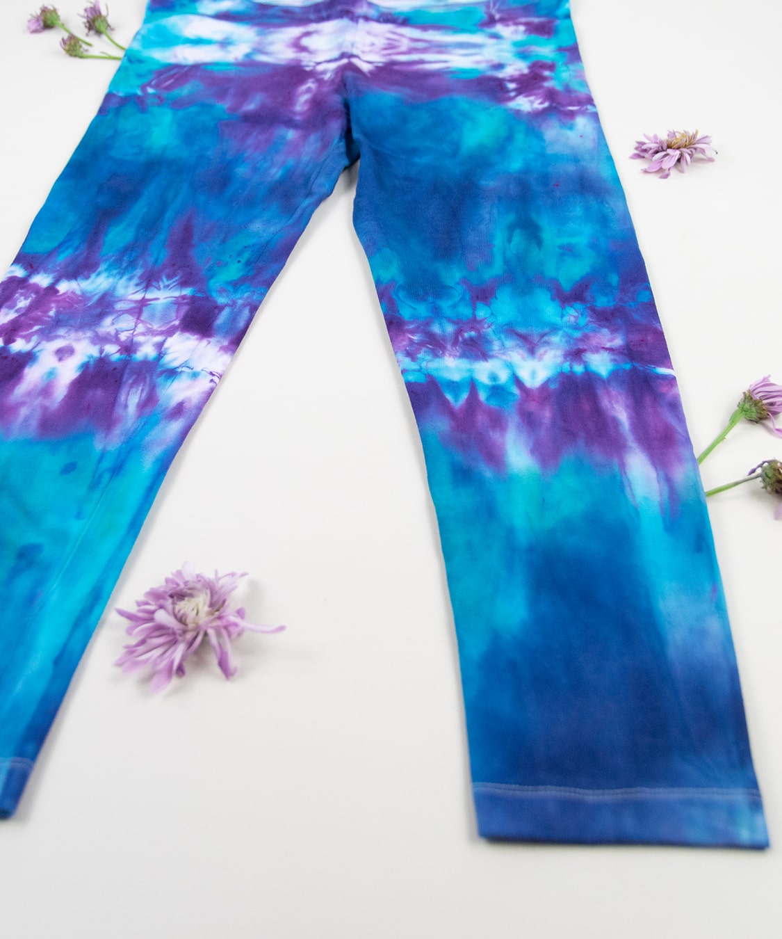 Blue and purple tie dye yoga leggings by Akasha Sun.