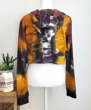 Amber tie dye hoodie crop top with drawstrings and hood.