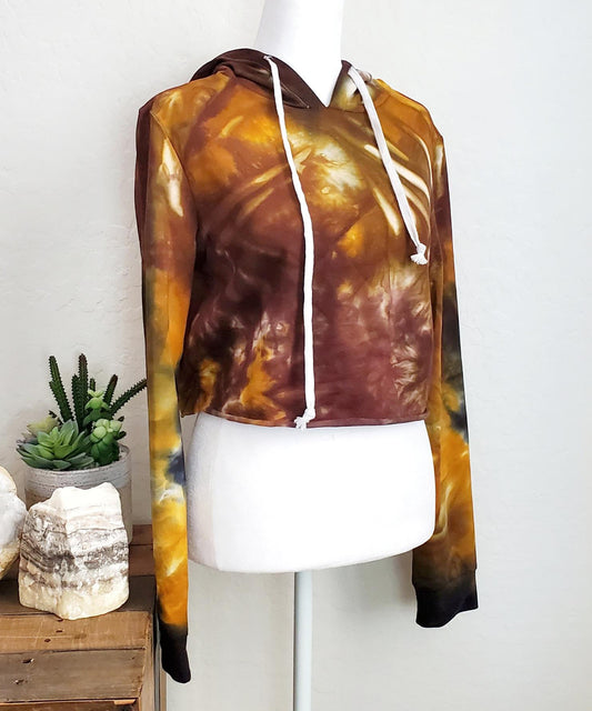 Amber tie dye hoodie crop top with drawstrings and hood.