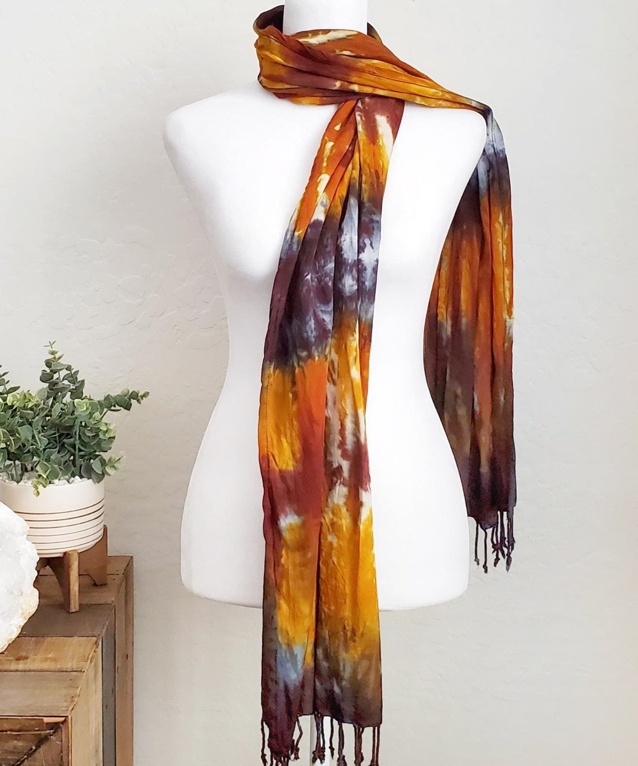 Amber tie dye scarf with fringe.