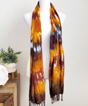 Amber tie dye scarf with fringe.