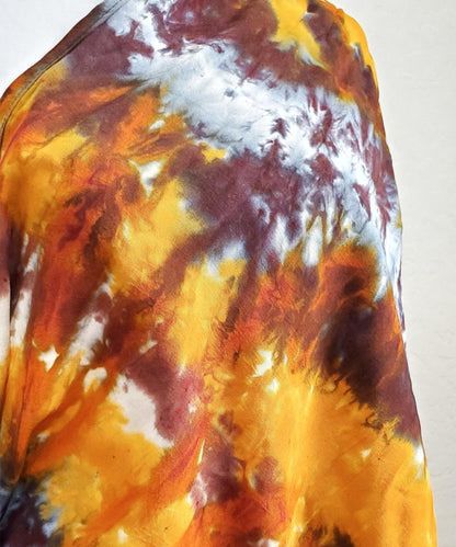 Amber tie dye scarf with fringe.