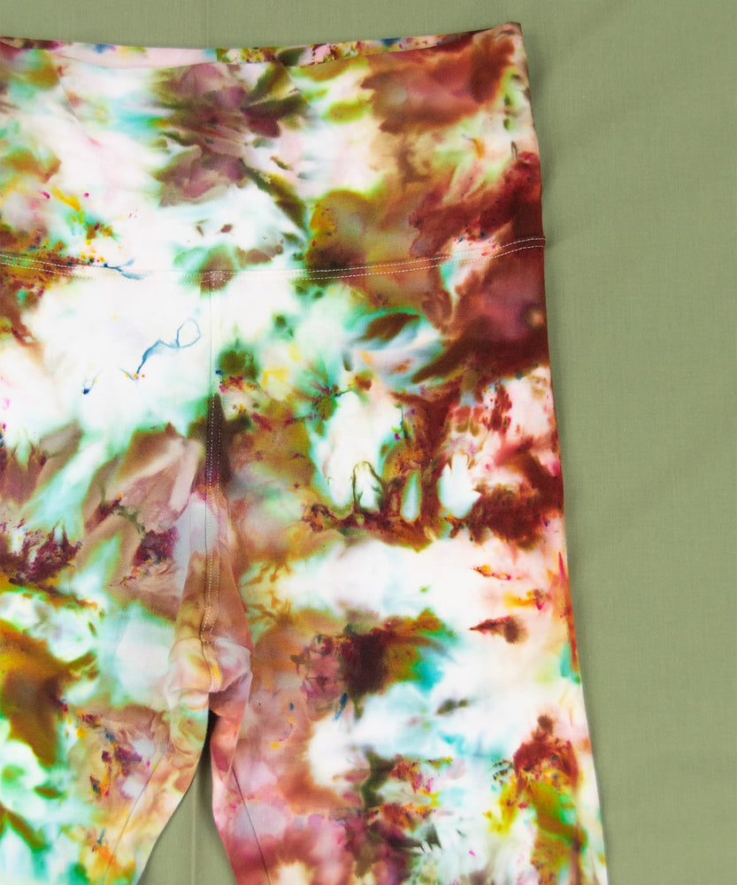 Ice dyed yoga pants featuring rusts and greens.