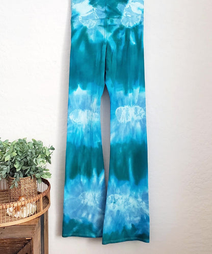 Teal tie dye yoga pants with wide waistband.