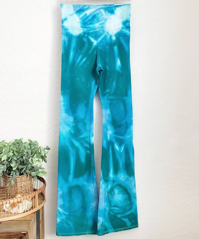 Teal tie dye yoga pants with wide waistband.