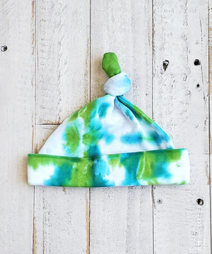 
                
                    Load image into Gallery viewer, A green and teal tie dye organic baby hat.
                
            