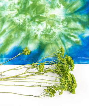 Green + blue tie dye crop top made of sustainable cotton by Akasha Sun.