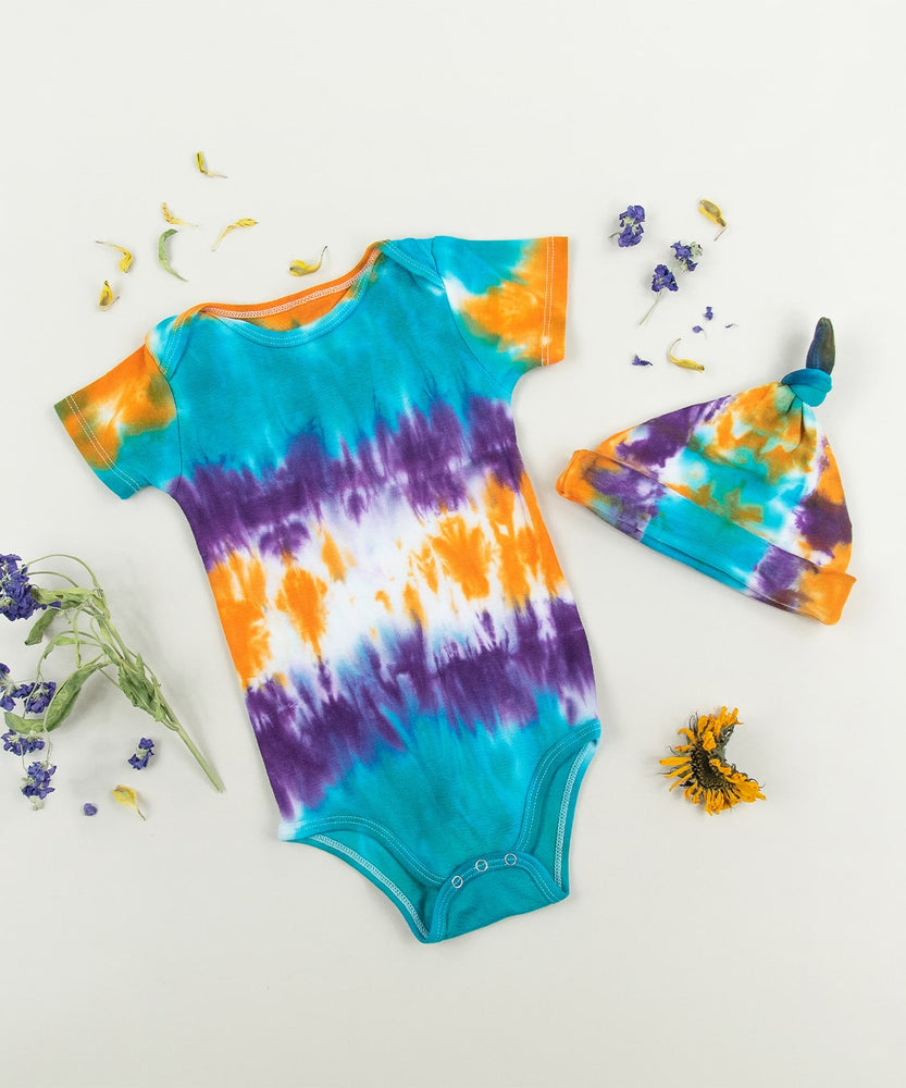 
                
                    Load image into Gallery viewer, Teal, purple, and orange tie dye organic cotton bodysuit and baby hat set by Akasha Sun.
                
            