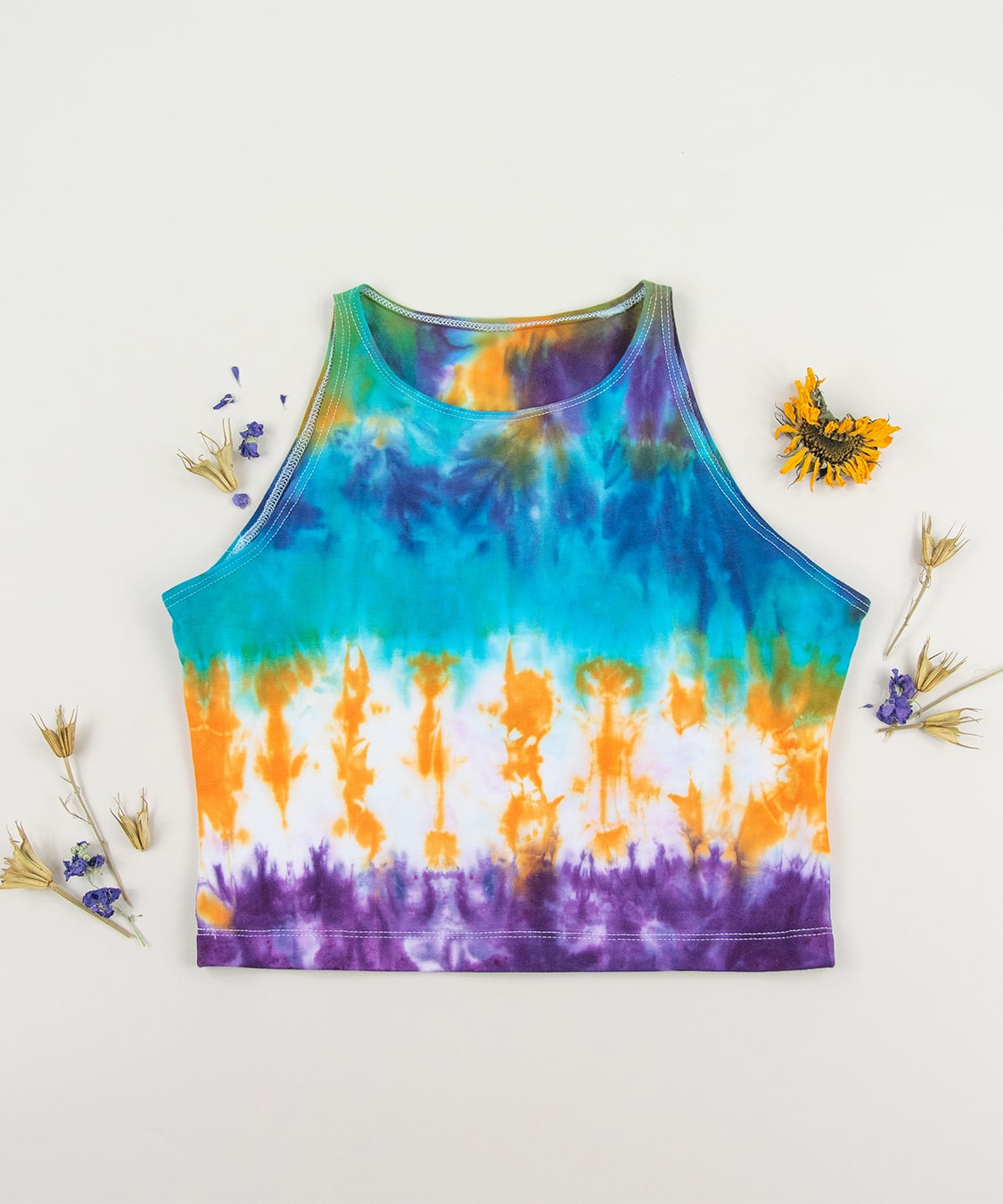 Blue, orange, and purple tie dye crop top by Akasha Sun.