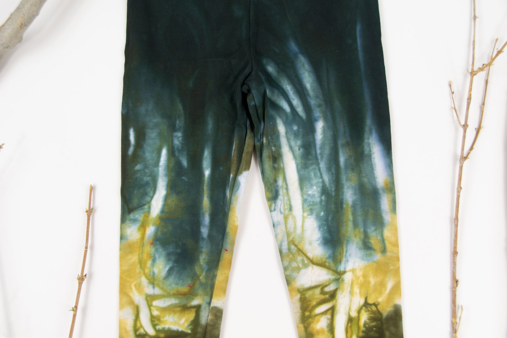 Black and gold tie dye leggings by Akasha Sun.