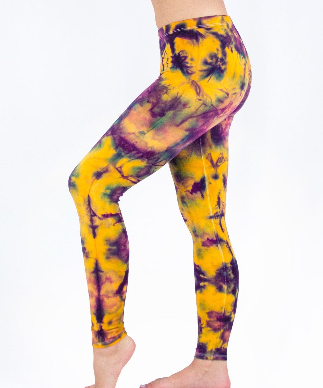 Woman wearing a pair of cotton tie dye leggings by Akasha Sun.