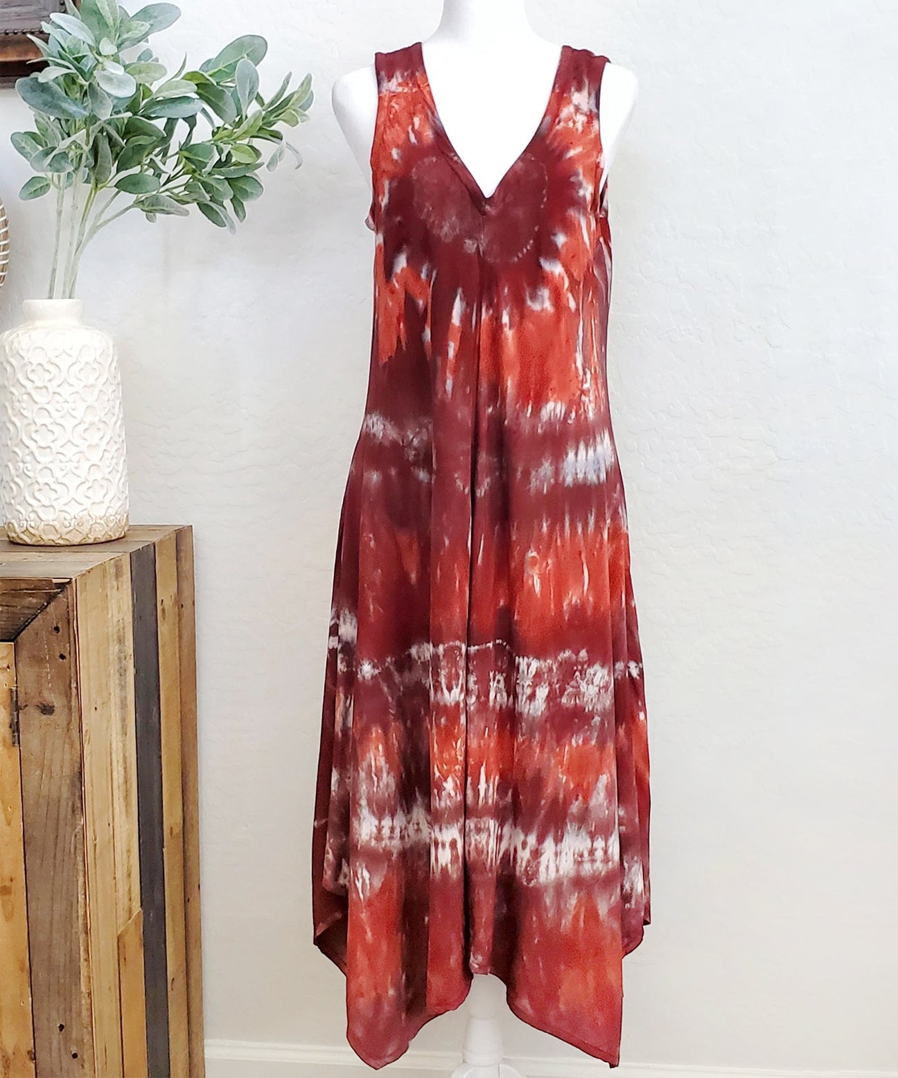 A rust orange and brown tie dye dress.