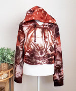 Rustic red and brown tie dye hoodie crop top with long sleeves.