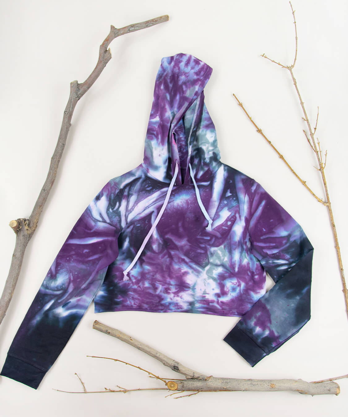 Purple and black tie dye hoodie crop top.