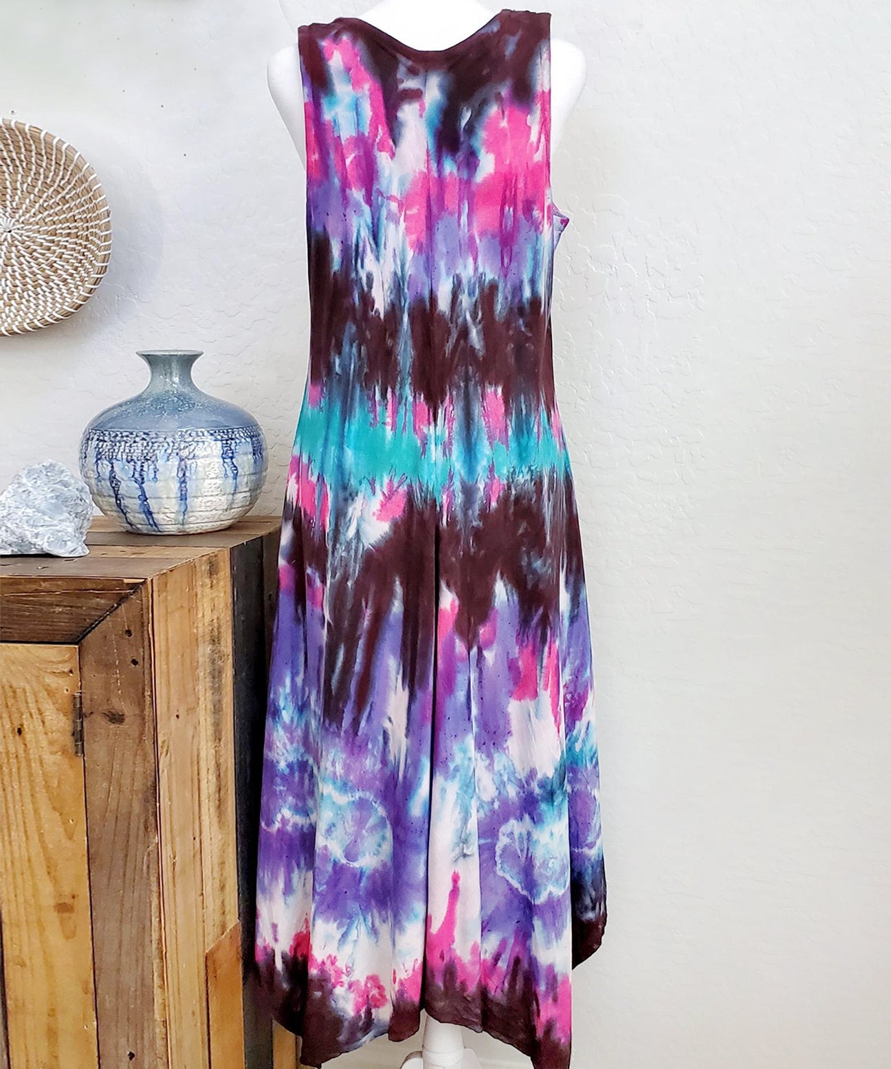 A teal, black, and purple tie dye dress.