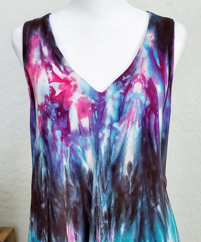 A teal, black, and purple tie dye dress.