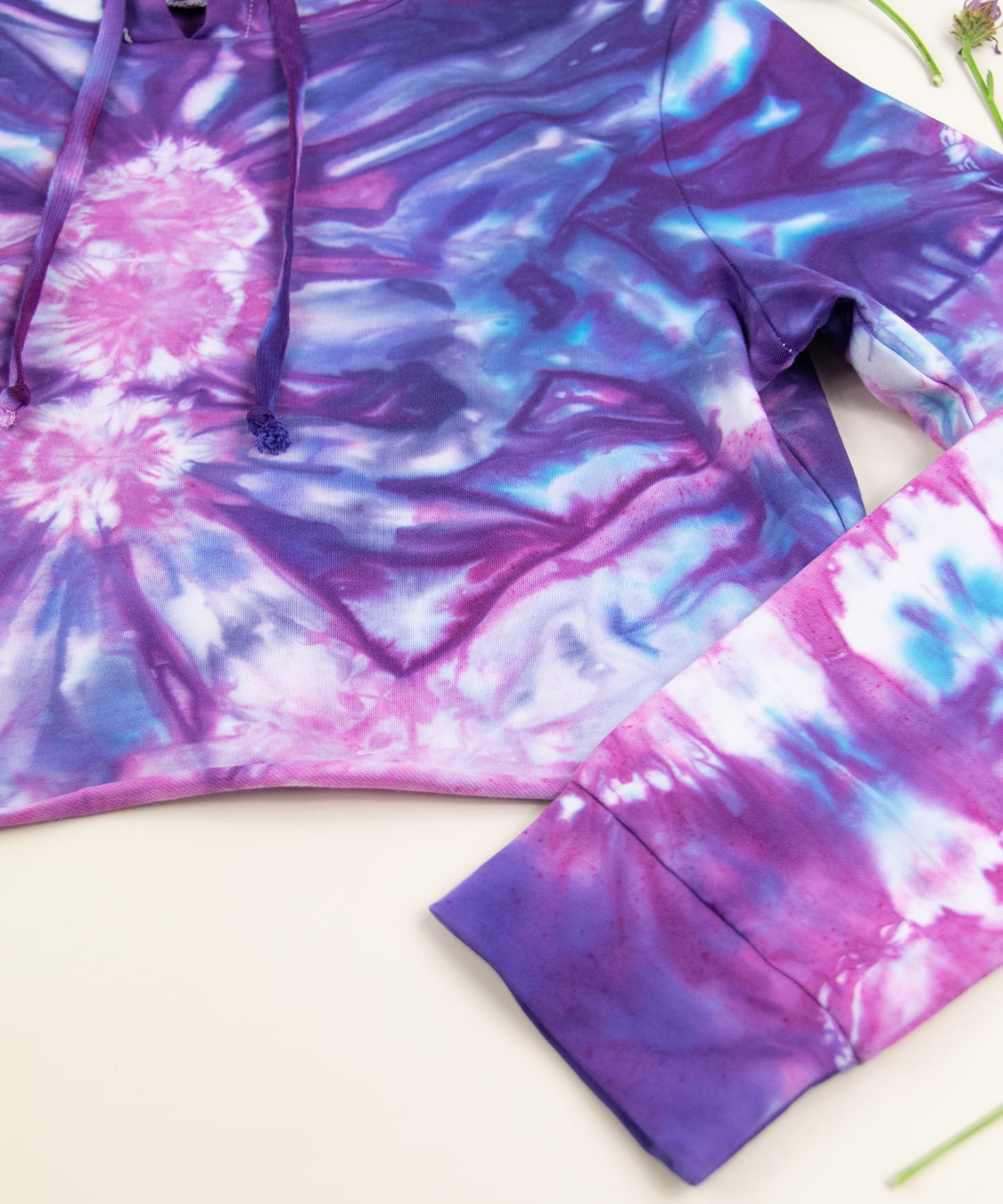 Purple and pink tie dye hoodie crop top by Akasha Sun.