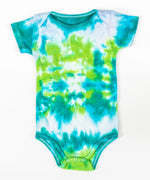 Teal and green tie dye onesie made of organic cotton.