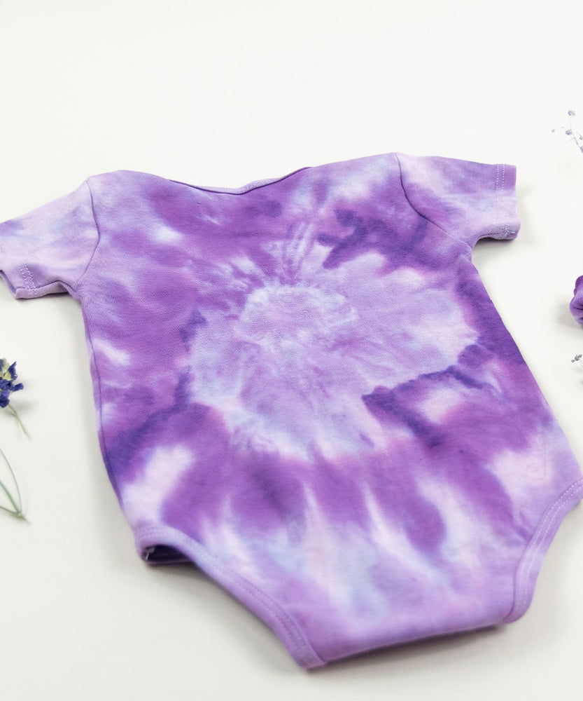 
                
                    Load image into Gallery viewer, Purple organic cotton tie dye baby bodysuit and hat by Akasha Sun.
                
            