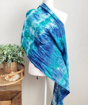 Teal and blue tie dye scarf with fringe.