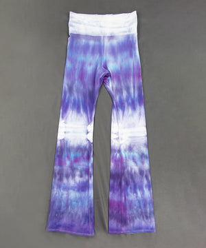 Lavender tie dye yoga pants with a wide waistband and flare bottoms.