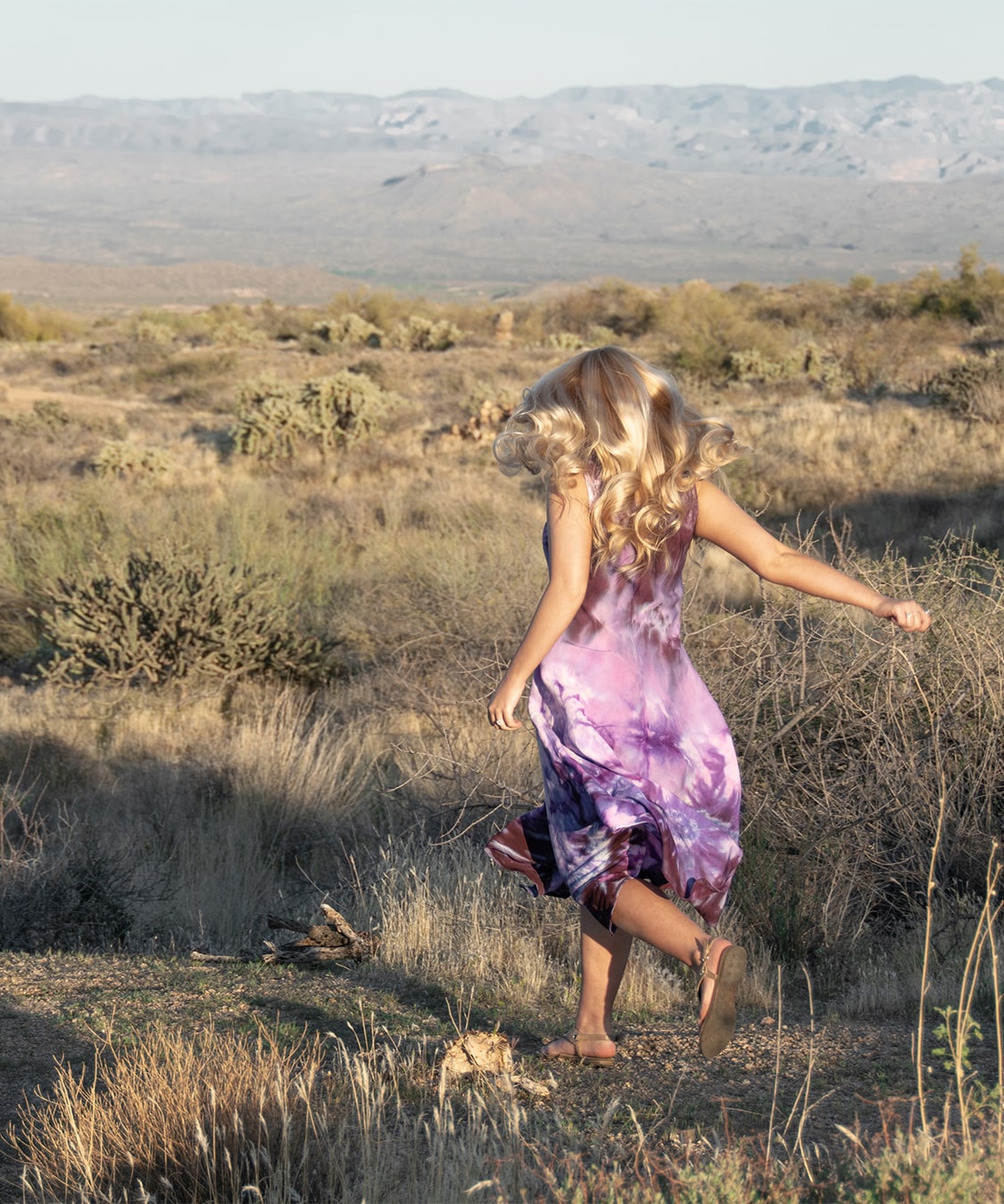 Purple and black tie dye dress by Akasha Sun.