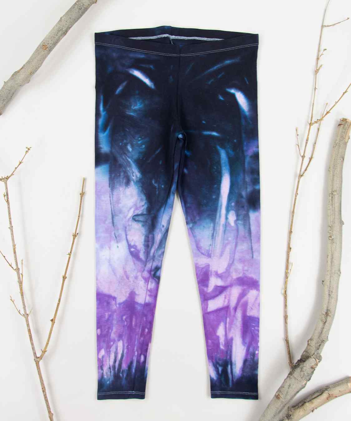 Purple and black tie dye leggings by Akasha Sun.