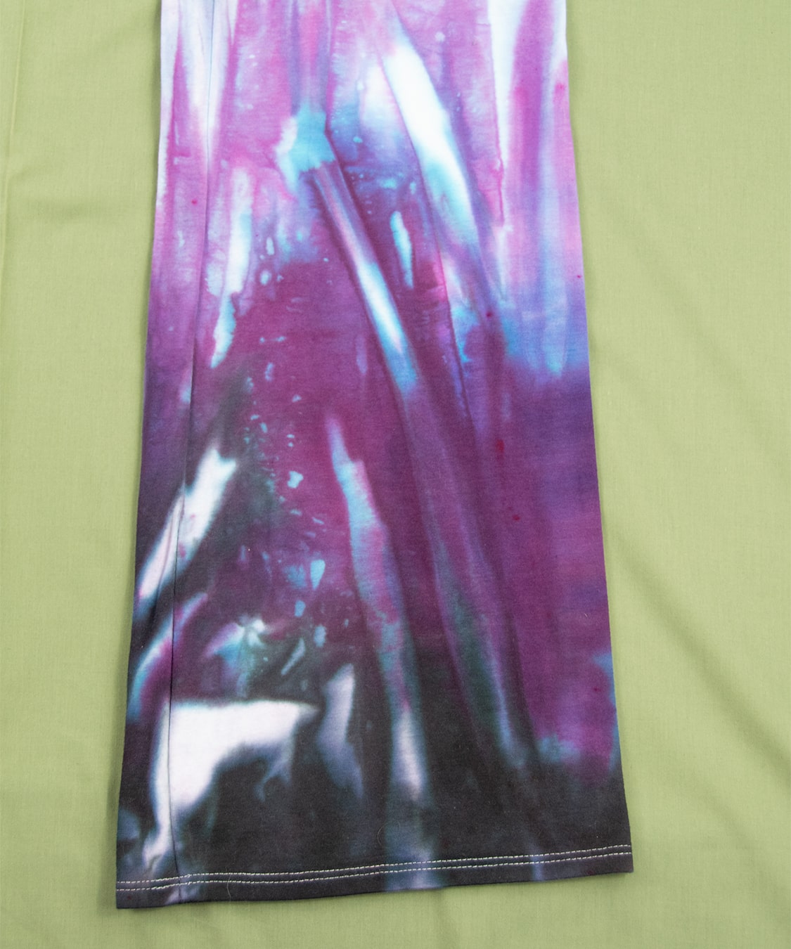 Purple and black tie dye yoga pants with wide waistband and flare bottoms by Akasha Sun.