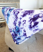 Purple and blue tie dye organic baby blanket.