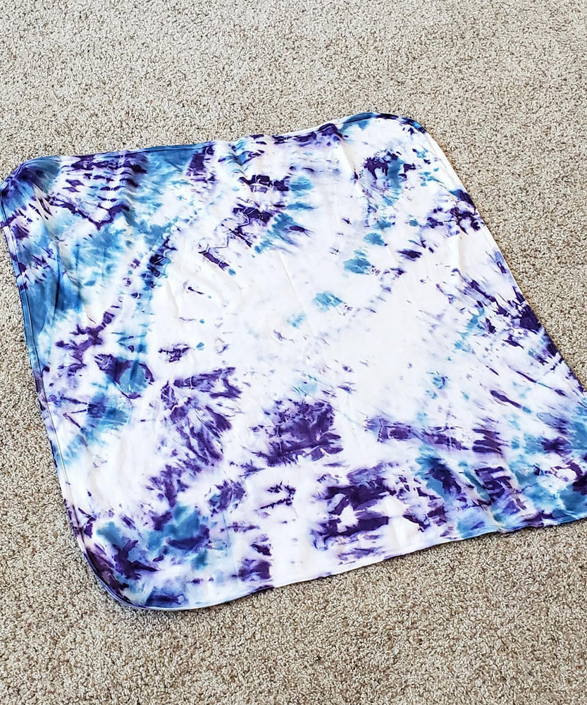 Purple and blue tie dye organic baby blanket.