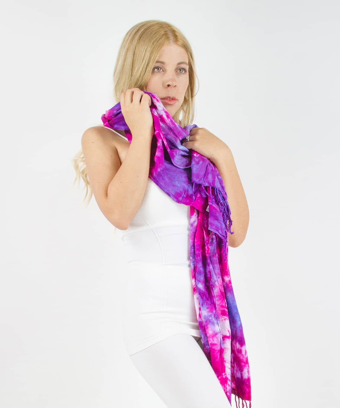 Woman wearing a pink and purple tie dye scarf by Akasha Sun.