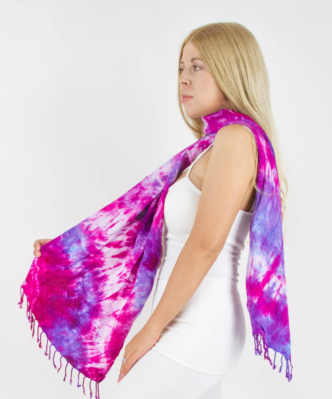 Woman wearing a pink and purple tie dye scarf by Akasha Sun.