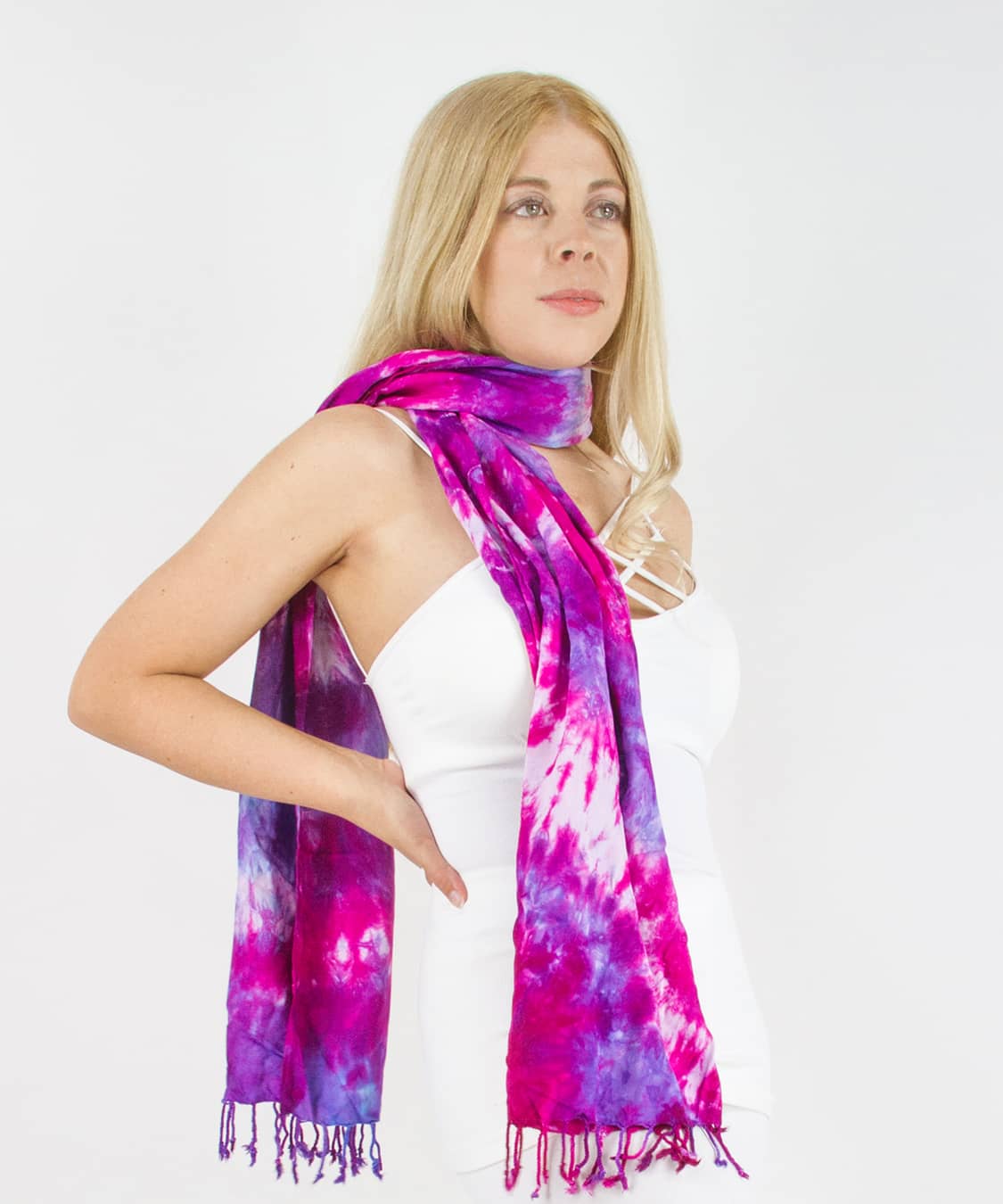 Woman wearing a pink and purple tie dye scarf by Akasha Sun.