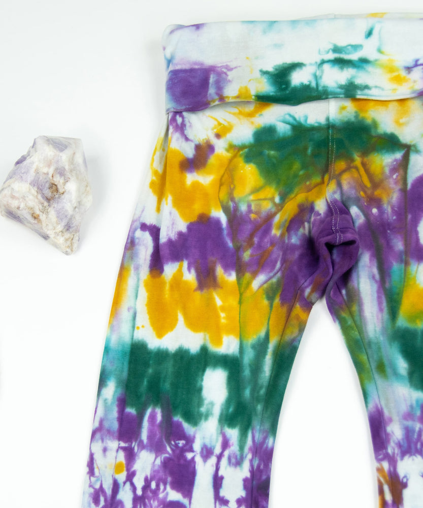 Tie dye Mardi Gras yoga pants with a foldover waistband by Akasha Sun.