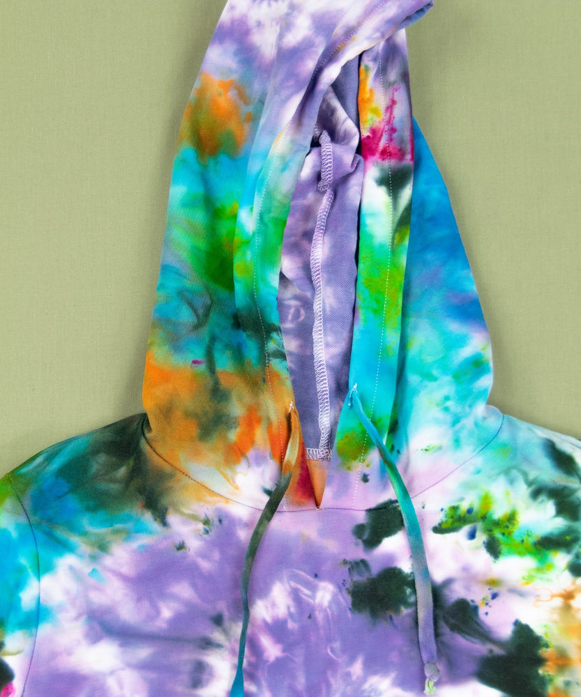 
                
                    Load image into Gallery viewer, Rainbow tie dye hoodie crop top with a hood and drawstrings.
                
            