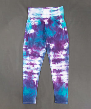 Blue and purple tie dye leggings with wide waistband.