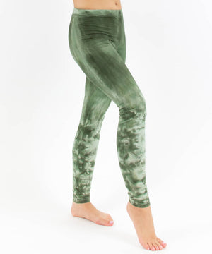 
                
                    Load image into Gallery viewer, Woman wearing a pair of green tie dye leggings perfect for yoga.
                
            