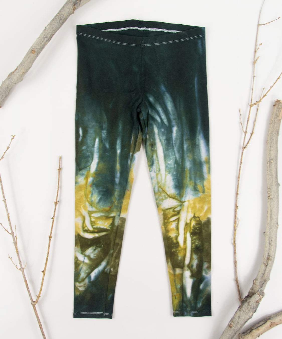 Black and gold tie dye leggings by Akasha Sun.