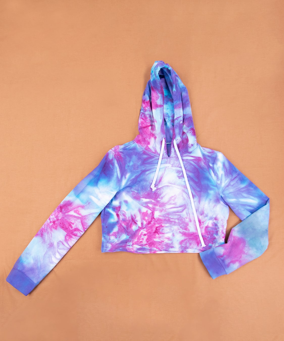 Purple and pink tie dye hoodie crop top by Akasha Sun.