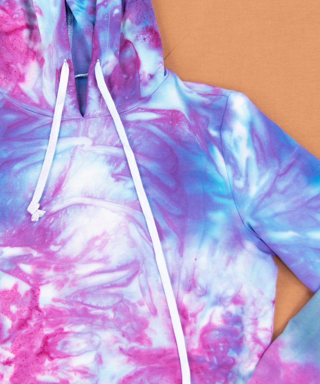 Purple and pink tie dye hoodie crop top by Akasha Sun.