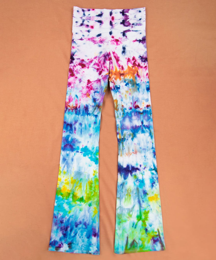 
                
                    Load image into Gallery viewer, Rainbow ice dye yoga pants with a wide waistband by Akasha Sun.
                
            