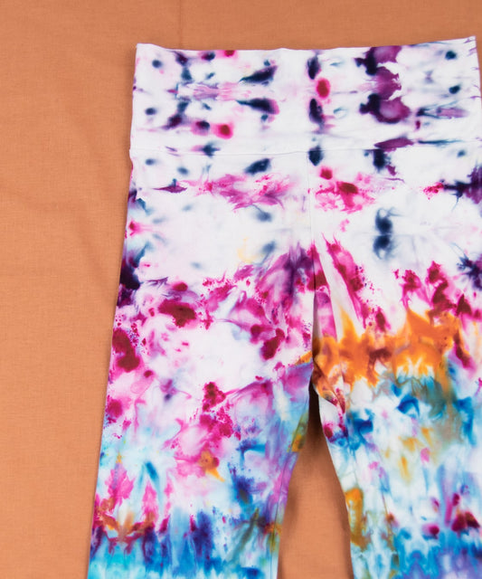 Rainbow ice dye yoga pants with a wide waistband by Akasha Sun.