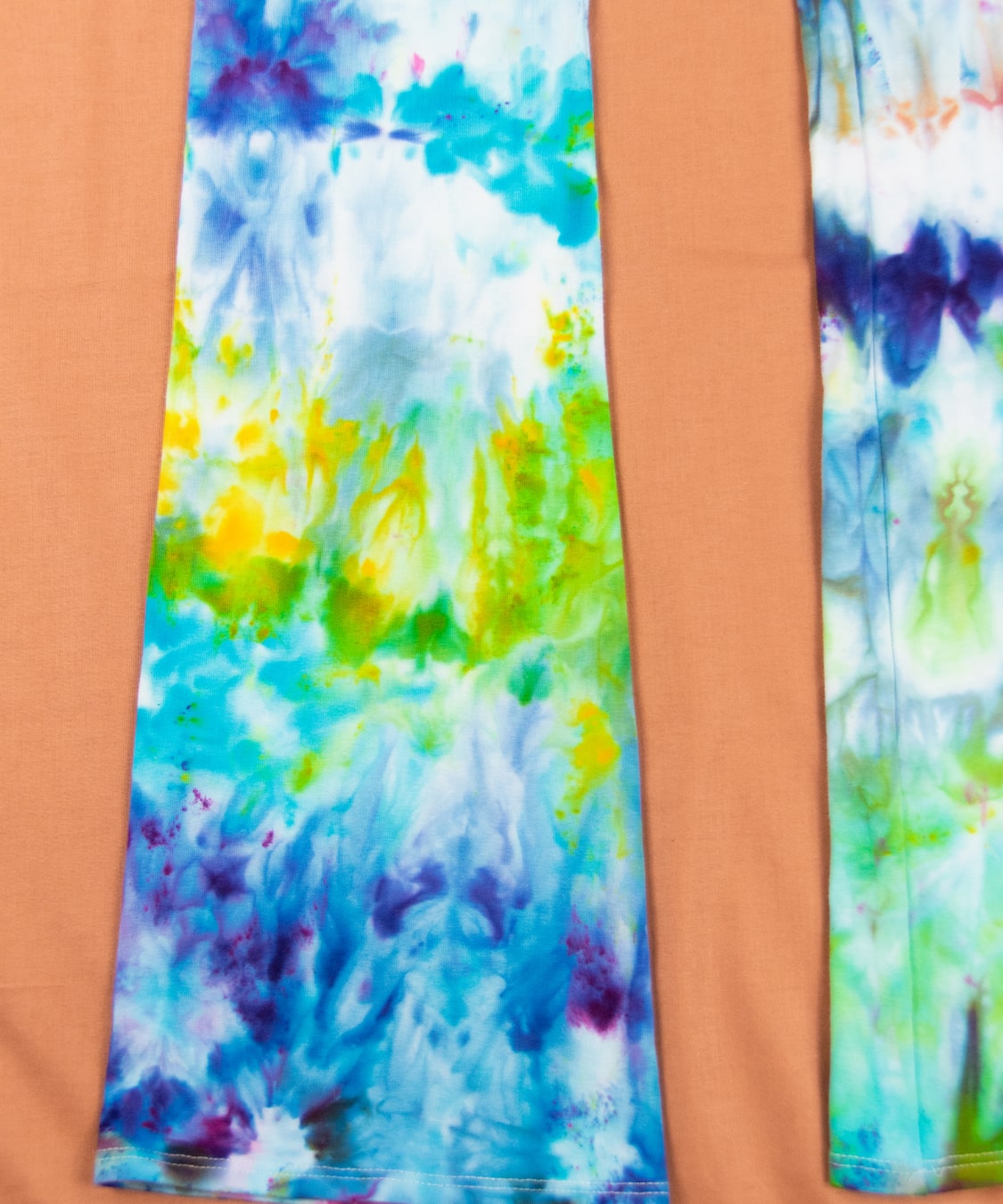 Rainbow ice dye yoga pants with a wide waistband by Akasha Sun.