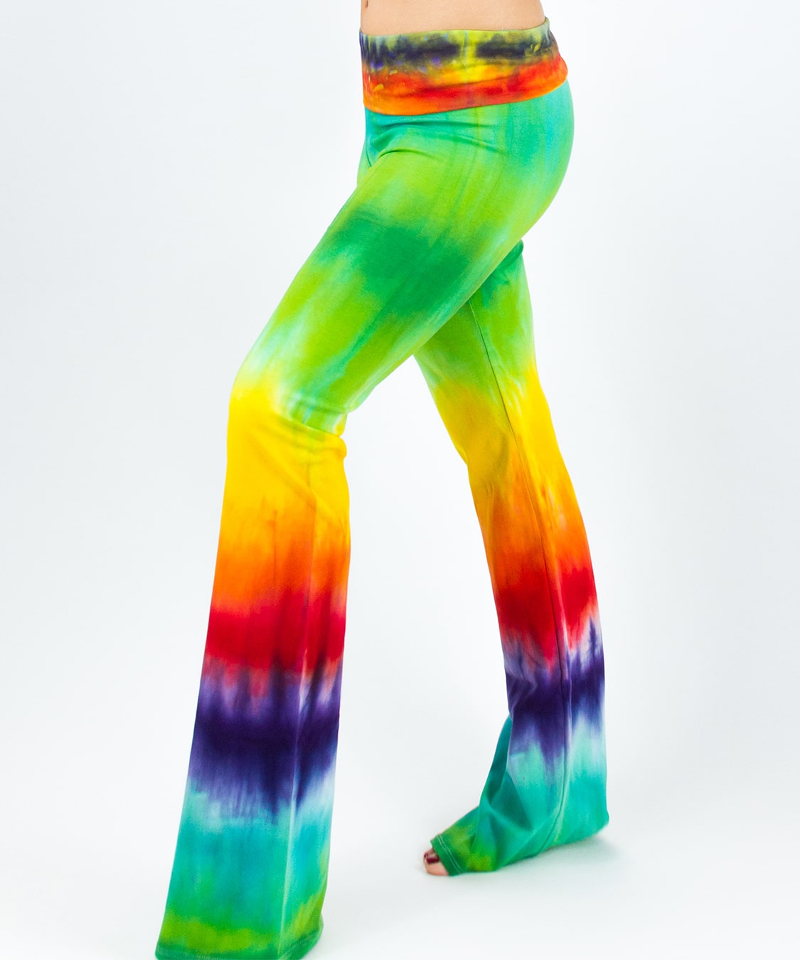 Rainbow tie dye yoga pants with a fold-over waistband.