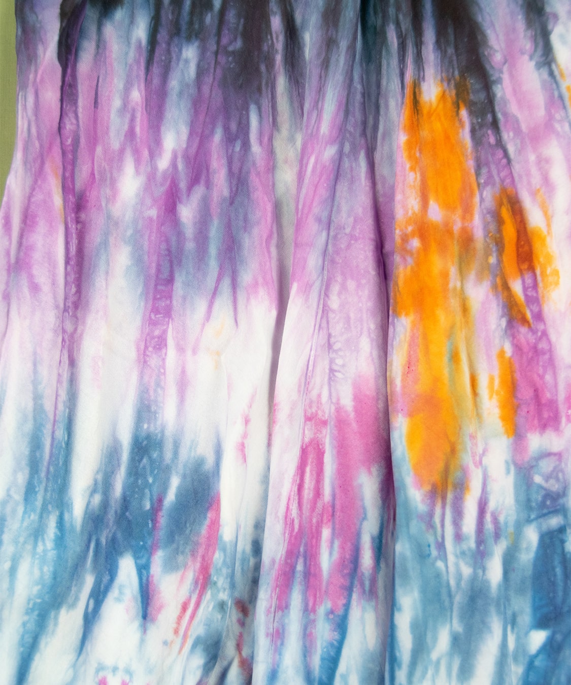 Black, blue, pink, and orange tie dye fairy dress by Akasha Sun.