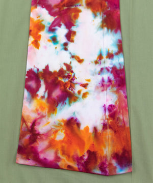 
                
                    Load image into Gallery viewer, Pink and orange ice dye yoga pants with a wide waistband and flare bottoms.
                
            