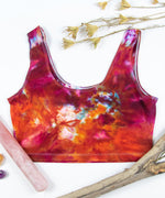 Pink, orange, and red tie dye crop tank by Akasha Sun.