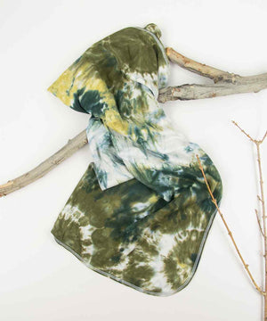 Green + Gold organic tie dye baby blanket by Akasha Sun.
