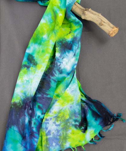 Navy blue, teal, and green tie dye scarf.